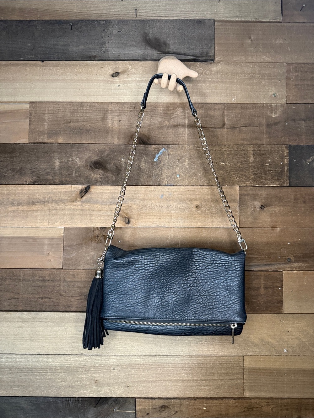 Express Black Shoulder Bag with Gold Chain and Tassel Accent
